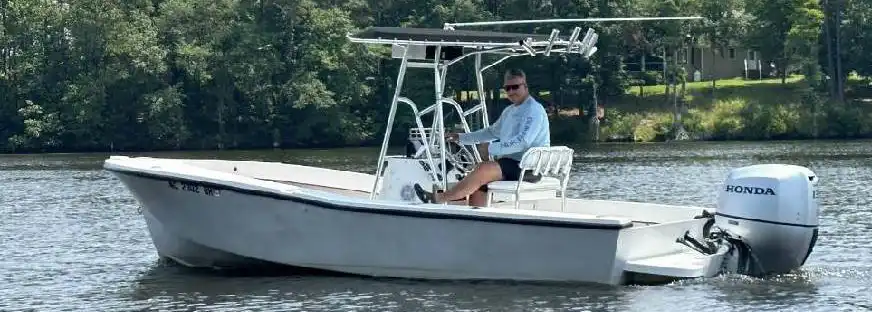 Swan Point center-console boat underway